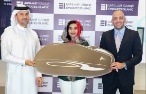 Emirates Islamic rewards Sudanese national Azza Taha Mohammed Ahmed Taha with a Tesla